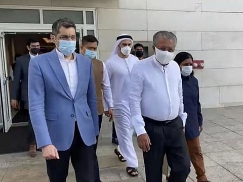 Kerala Chief Minister Pinarayi Vijayan (R) was received by the Consul General of India in Dubai, Dr Aman Puri (L), and other protocol officials at Dubai International Airport on Saturday