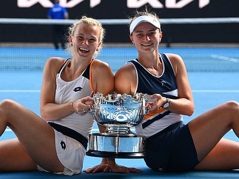 Czech Republic's Barbora Krejcikova and Katerina Siniakova celebrate with the trophy after winning their final match against Kazakhstan's Anna Danilina and Brazil's Beatriz Haddad Maia.
