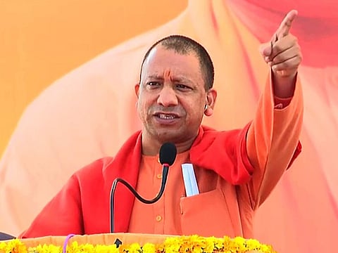 Uttar Pradesh Chief Minister Yogi Adityanath addresses during the 'Prabhavi Matdata Samvad' ahead of assembly elections, at Kirawali, in Agra on Monday.  