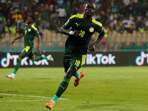 Senegal's Sadio Mane celebrates scoring their third goal.