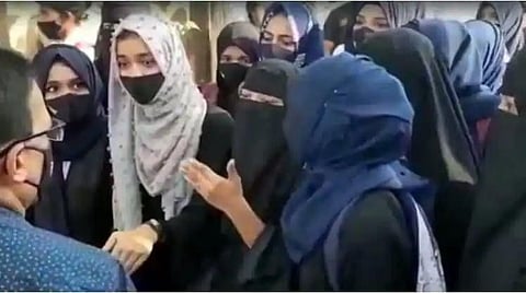 Girls of Kundapur Pre-University College in Udupi who have been stopped at the entrance. 