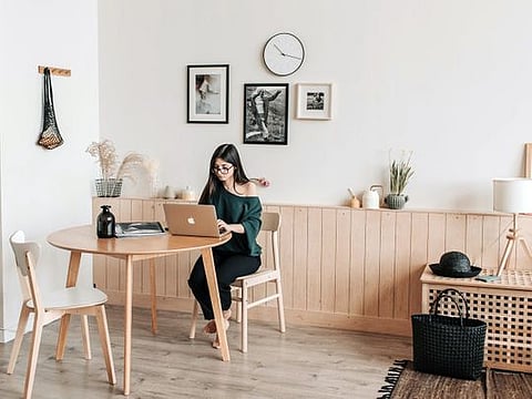 A round table with some plants will definitely help create a sense of 'green care' around your desk space