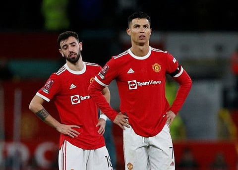 Manchester United's Cristiano Ronaldo and Bruno Fernandes react after being dumped out of the FA Cup 4th round by Middlesbrough at Old Trafford.