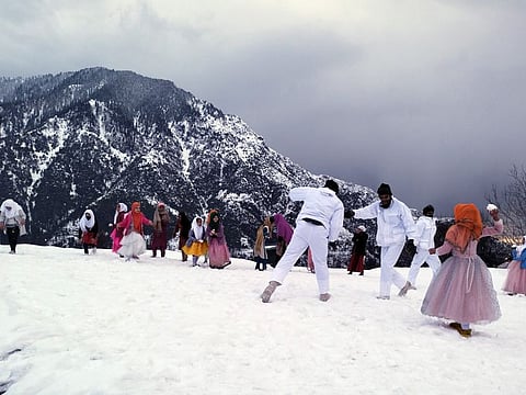 Soldiers play with children on the snow-covered Darhal Budhal Range in Rajour as the upper reaches of Jammu and Kashmir receives fresh snowfall. The picturesque mountainous province is home to ski resorts and some of the largest military deployments.