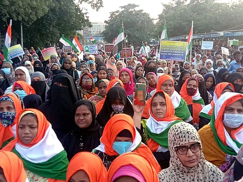 Members of Tamil Nadu Thowheed Jamath stage a protest in favour of hijab (headscarf), in Chennai on Tuesday.  