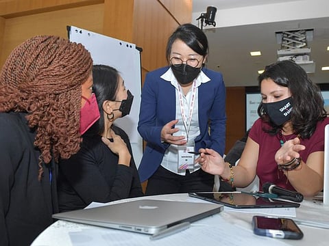 Asia School of Business students during the five-hour hackathon in Dubai on Tuesday