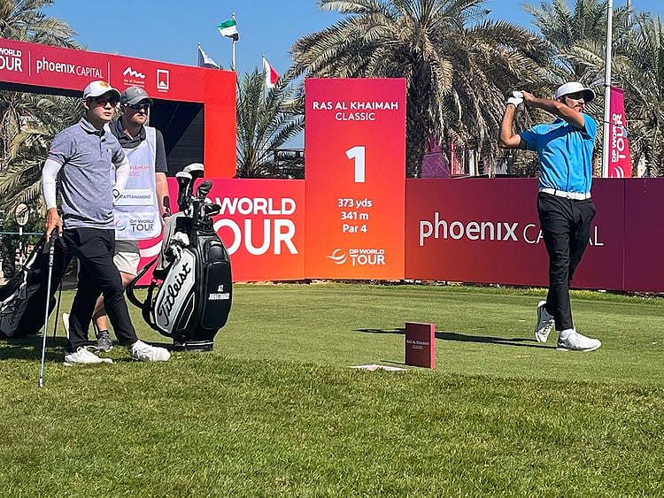 Ahmad Skaik in action at the RAK Classic alongside Jazz Janewattanond 