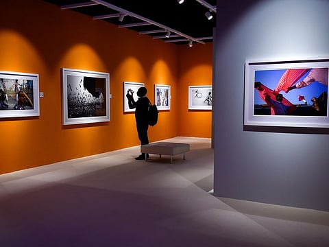 A visitor checks out the work of photographer Vineet Vohra at the sixth edition of Xposure International Photography Festival in Sharjah on Wednesday.