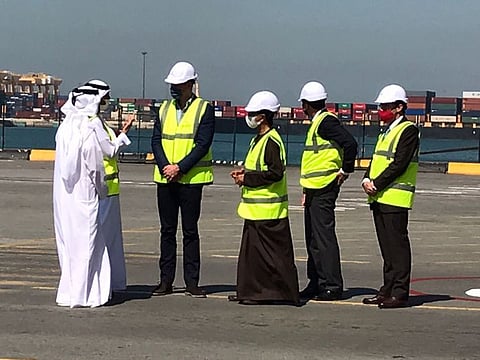 Prince William (fourth from right) interacts with officials at Dubai's Jebel Ali Port during his visit today. 