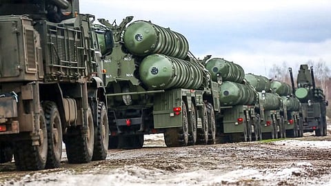 This handout video grab released by the Russian Defence Ministry on February 9, 2022 shows combat crews of the S-400 air defense system driving during joint exercises of the armed forces of Russia and Belarus as part of an inspection of the Union State's Response Force, at a firing range in Brest region of Belarus.