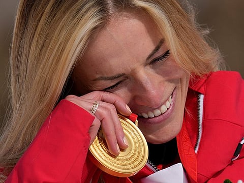 Tears of joy: An emotional Lara Gut-Behrami of Switzerland after finally keeping her date with the gold medal on Friday.