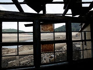 Photos: Ghost village emerges in Spain as drought empties reservoir