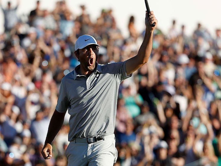 Scottie Scheffler celebrates after winning the the WM Phoenix Open