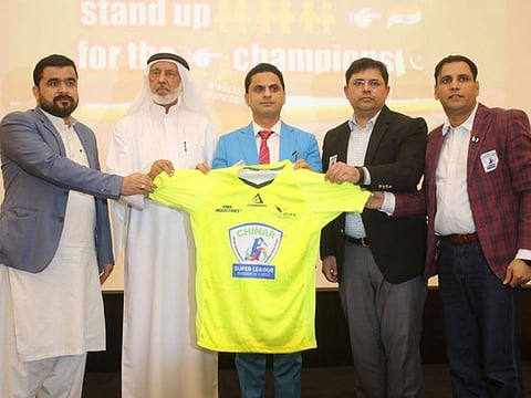   Pakistan Consul General Hasan Afzal Khan (second from right), Sajid Abbas, Raja Mohammed Khan and Asad Khalid at the Chinar Super League kit launching ceremony in Ajman.