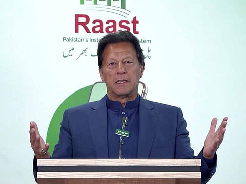 Imran Khan launches instant payment service Raast on February 15, 2022, in Islamabad.
