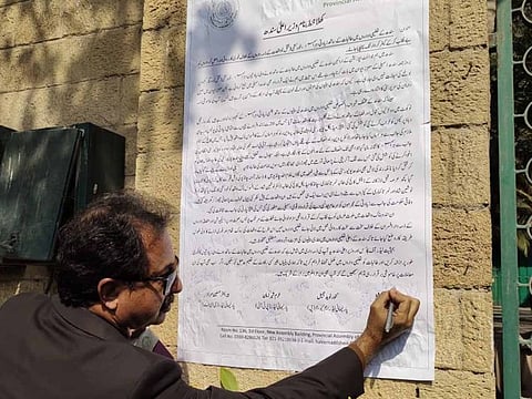  Leader of Opposition in Sindh Assembly, Haleem Adil Shaikh, signs the open letter pasted on CM House on the issue of harassment of female students on campuses in Sindh.