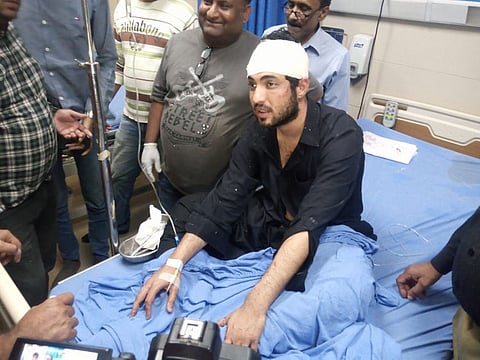 Iqrar Ul Hassan, under treatment at a Karachi's hospital, after allegedly being tortured at Intelligence Bureau's office.