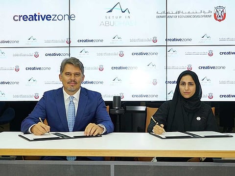 Mouza Obaid Al Nasiri, Executive Director SMEs Sector, ADDED and Lorenzo Jooris, CEO, Creative Zone at MoU signing ceremony.