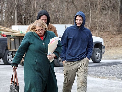Kirk D. Shultis Sr. and Kirk D. Shultis Jr. arrive at court for charges of custodial interference and endangering the welfare of a child of 6-year-old Paislee Shultis who was found by police in a makeshift room underneath a staircase, in Saugerties, New York, U.S., February 16, 2022.