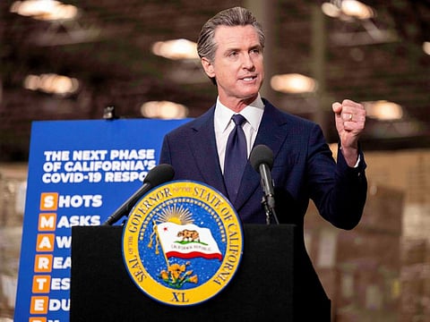 Gov. Gavin Newsom announces the next phase of California’s COVID-19 response called “SMARTER,” during a press conference at the UPS Healthcare warehouse in Fontana on Thursday, Feb. 17, 2022.
