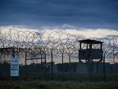File photo: The sun sets behind the closed Camp X-Ray detention facility, in Guantanamo Bay Naval Base, Cuba.  