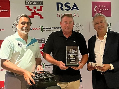 Winner of the February Senior Champions Tour Order of Merit event Marcus Burley with co-founder of Golf & Co Vijay Vasu and EGF's General Abdullah Alhasmi