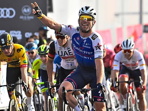 Britain's Mark Cavendish celebrates after winning Stage 2 of the UAE Cycling Tour from Hudayriyat Island at Abu Dhabi Breakwater, UAE.