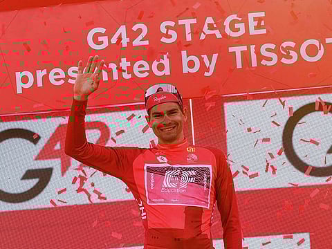 EF Education rider Stefan Bissegger, of Switzerland, on the podium after winning the third stage of UAE Tour on Tuesday.