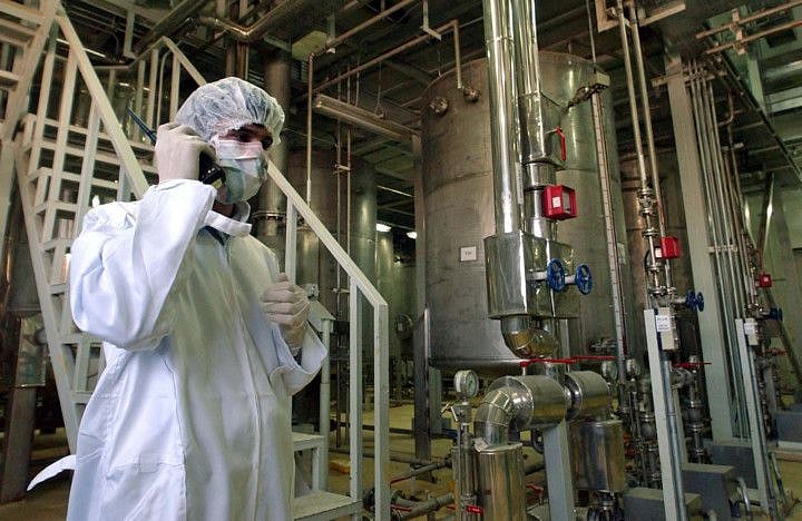 An Iranian security officer at a Uranium Conversion Facility just outside the city of Isfahan, Iran.