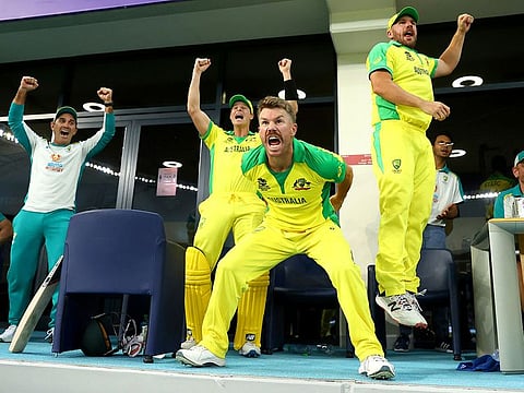 Justin Langer, then chief coach, celebrates Australia's triumph in Twenty20 World Cup along with the players in Dubai last year. 