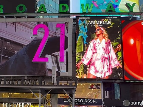 Larimelle, a fashion brand made in Dubai, featured on a billboard in Times Square, New York