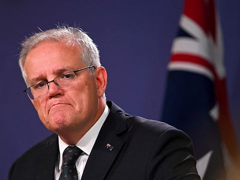 Australia's Prime Minister Scott Morrison speaks to the media to announce sanctions on top Russian officials following the invasion of eastern Ukraine, during a press conference in Sydney on February 23, 2022. 