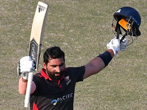 UAE opener Muhammad Waseem celebrates his century in the final of the ICC Twenty20 World Cup qualifier against Ireland at Al Ameerat in Oman on Thursday.