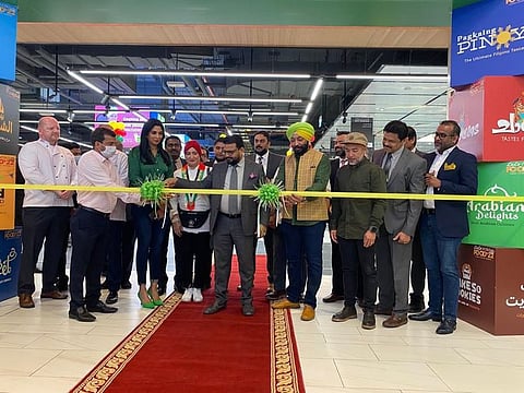 Malayalam actress and Dubai-based RJ Nyla Usha, chefs Manal Alaalem, Harpal Singh Sokhi and J.P. Anglo with the Lulu corporate team at the launch of the Lulu Food Fiesta at Lulu Hypermarket in Dubai Silicon Oasis on Thursday.