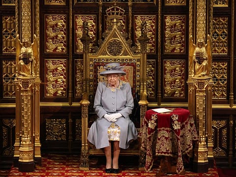 Britain's Queen Elizabeth II sits on the The Sovereign's Throne in the House of Lords chamber during the State Opening of Parliament at the Houses of Parliament in London in a file photo.