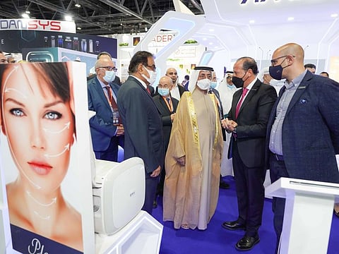Sheikh Hasher bin Maktoum Al Maktoum touring the trade show 