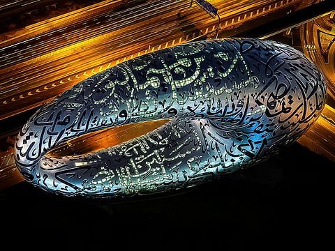 The museum's lighting system illuminates the Arabic calligraphy designed by Emirati artist Mattar Bin Lahej