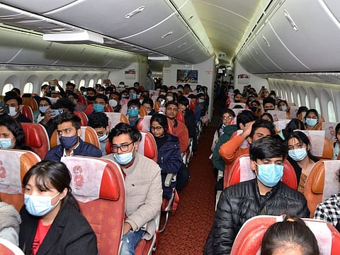 Indian nationals evacuated from Ukraine, on board a special Air India flight arrive at the Indira Gandhi International Airport, in New Delhi on Monday, Feb 28, 2022.