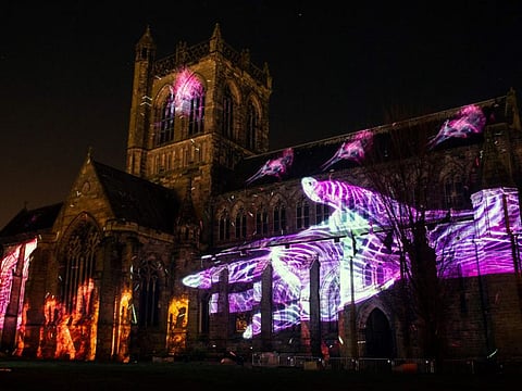 Paisley Abbey is illuminated during a photocall for an installation entitled 'About Us', created by 59 Productions, as part of the UNBOXED: Creativity in the UK event, in Paisley, Scotland.
