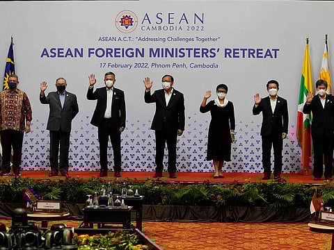 Foreign ministers of the Association of Southeast Asian Nations (ASEAN), from left, pose for a photo during a photo session in Phnom Penh, Cambodia