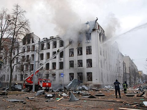 Firefighters work to extinguish a fire at the Kharkiv National University building, which city officials said was damaged by recent shelling, in Kharkiv, Ukraine March 2, 2022. REUTERS/Oleksandr Lapshyn