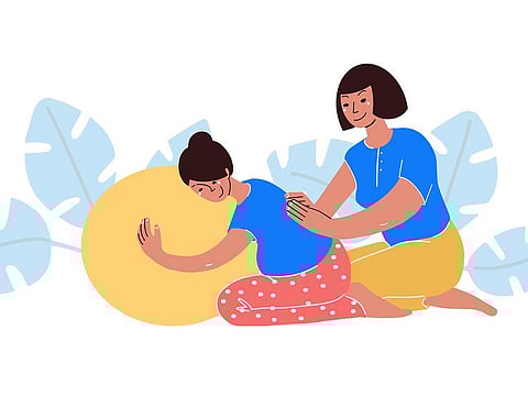 A doula is a trained professional who provides continuous physical, emotional and informational support to a mother before, during and shortly after childbirth. 