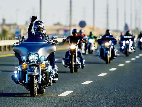 Riders of the Harley-Davidson Owners Group Dubai rumble through the streets of Dubai en route to Ajman.