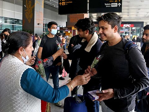 Indian nationals being welcomed on their arrival after being evacuated from war-torn Ukraine under Operation Ganga at IGI Terminal 3 Airport, in New Delhi on Friday,  Mar 4, 2022. 