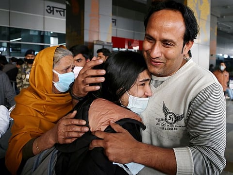 An Indian national meets with his family member after being evacuated from war-torn Ukraine under Operation Ganga at IGI Terminal 3 Airport, in New Delhi on Friday, Mar 4, 2022.
