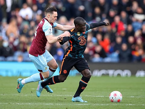 Burnley's Connor Roberts in action with Chelsea's N'Golo Kante at Turf Moor during their Premier League clash. Chelsea won 4-0.
