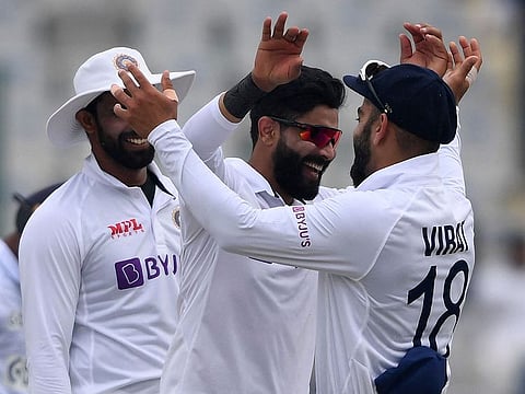 India's Ravindra Jadeja celebrates with Virat Kohli during the victory over Sri Lanka in the first Test