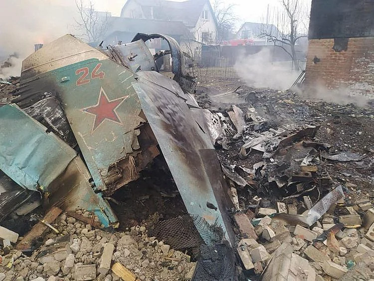Remains of the Russian fighting aircraft are seen at a residential area, in Chernihiv, Ukraine. 
