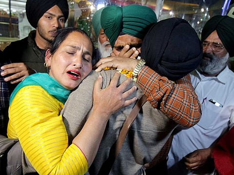 An Indian student being embraced by family members on his arrival from war-torn Ukraine after being evacuated under 'Operation Ganga'', at Amritsar airport in Amritsar on Monday, Mar 7, 2022. 