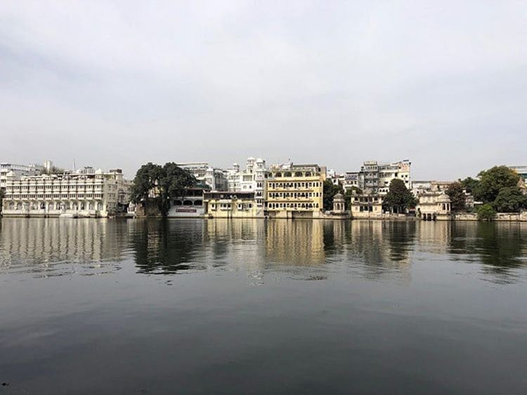 The calm waters of Lake Pichola belie the colourful life that thrives in the narrow lanes of the old city of Udaipur, skirting this manmade water body.